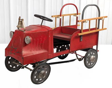Steelcraft Mack City Fire Dept. Ladder Truck Pedal Car: Repainted Steelcraft Mack City Fire Dept. ladder truck pedal car. The truck has an older overpaint. Displays well with mounted headlights, bell, wooden ladders, rear suspension, and replaced chrome
