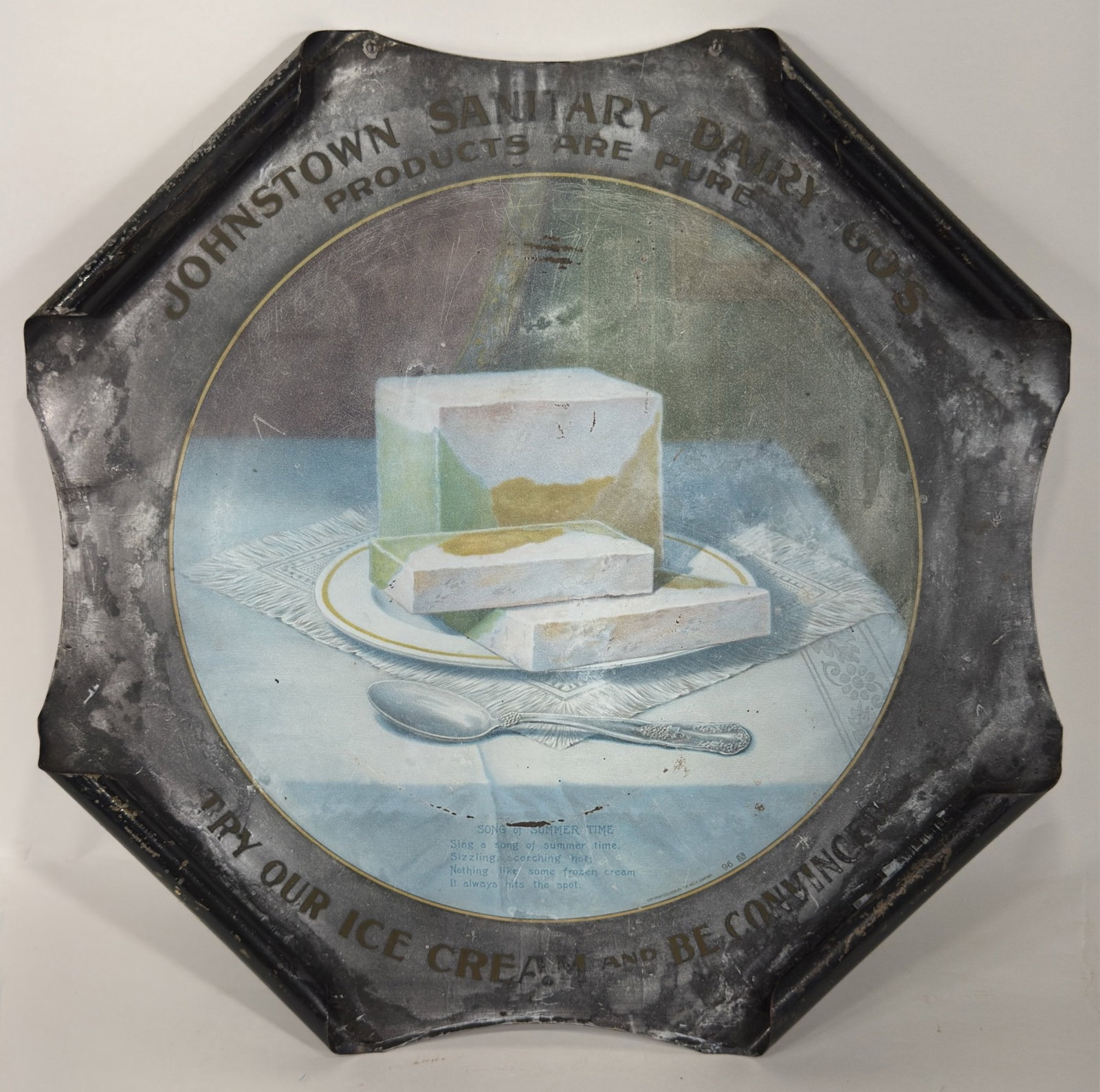 Early SST Johnstown Sanitary Dairy Goods Ice Cream Sign: Early single sided metal Johnstown Sanitary Dairy Goods Ice Cream sign. Has paint loss, fading, and other wear from use and age. Displays well with nice graphics. It measures approximately 14-1/2in ta