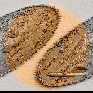 1877A France 20 Francs Gold Coin: 1877A France 20 Francs Gold Coin. The coin is .900 fine gold and the actual gold weight is 0.1867 troy ounces. Nice circulated condition.