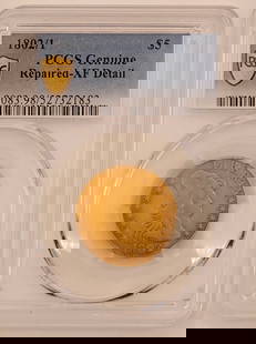 1802, 2 Over 1 United States Capped Bust $5 Gold Piece PCGS Genuine Repaired XF Detail: 1802, 2 Over 1 United States Capped Bust To Right $5 Dollar Gold Piece. Graded Genuine Repaired XF Detail by PCGS. The coin contains .2577 troy ounce of pure gold.