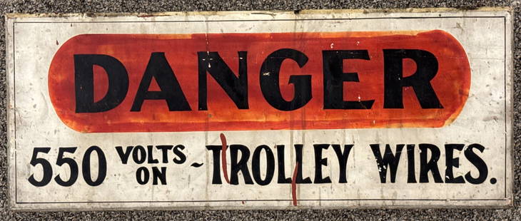 Early SSW Danger Trolley Wires Sign: Incredible early single sided wood " Danger 550 Volts Trolley Wires " sign. Nice original condition with paint loss, discoloration, and wear from use and age. Displays extremely well with