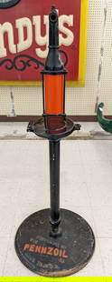 Vintage Pennzoil Lubester Pump On Pennzoil Cast Iron Base: Vintage Phillips Model no.17 lunester pump mounted on vintage cast iron Pennzoil base. Has paint loss, scratches, and wear. Overall it measures approximately 53in tall by 22in in diameter.