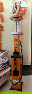 Custom Lion Service Station Visible Gas Pump Replica: Custom made Lion service station visible gas pump replica. It features a metal body, glass cylinder, and glass globe. Appears to be in nice condition with wear from display and storage. Displays well.