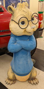 Giant 57in Alvin & The Chipmunks Simon Fiberglass Statue: Giant Alvin and the Chipmunks Simon fiberglass statue prop. Has some paint loss, fading, scratches, cracks in fiberglass, and other wear from display and storage. It measures approximately 57in tall.