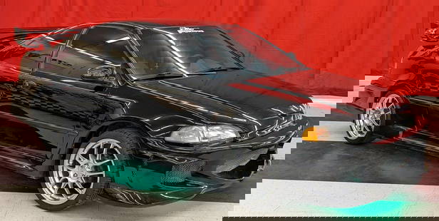 The Fast and the Furious Replica 1994 Honda Civic Coupe: Full correct movie body kit, under glow, and other small details correct to the movie. Comes with the racers helmet similar to that in the movie. Car does have some scuffs and wear on the interior fro