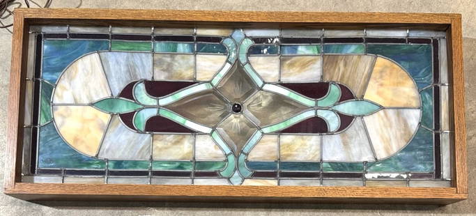 Victorian Leaded Stained Glass Panel Framed and Lighted: Victorian Leaded Stained Glass Panel Framed and Lighted. This beautiful stained glass window has a gorgeous design with wonderful colors throughout. It is in nice used condition with discoloration and