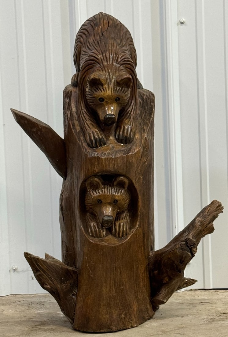 2-1/4ft Tall Carved Wood Bear Cub Tree Stump Sculpture: 2-1/4ft Tall Carved Wood Bear Cub Tree Stump Sculpture. This sculpture features two bears together looking downward, with one bear inside of the sculpture which looks to be a type of tree. It is in ni