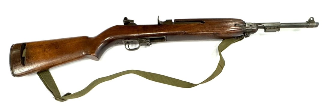 WW II Winchester M1 Carbine .30 Caliber Rifle: WW II Winchester M1 Carbine .30 Caliber Rifle.? The Winchester M1 carbine is in very nice used condition.? Barrel measures 18 inches in length.? Barrel has the flaming bomb with WRA below it, also dat