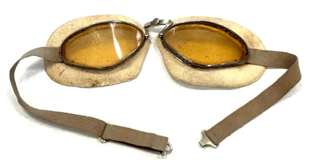 WW2 German Luftwaffe Pilot Goggles: WW2 German Luftwaffe Pilot Goggles. Goggles are inscribed with V 298.253 and has wear and ripping from age and wear. Goggles Measure 9"