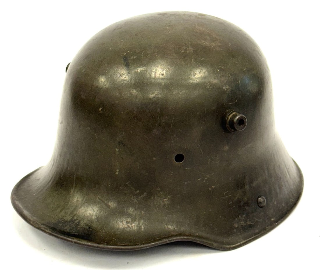 German M16 Helmet Shell: German M16 Helmet Shell. No liner. Appears to Have Original Greenish/Brown Paint