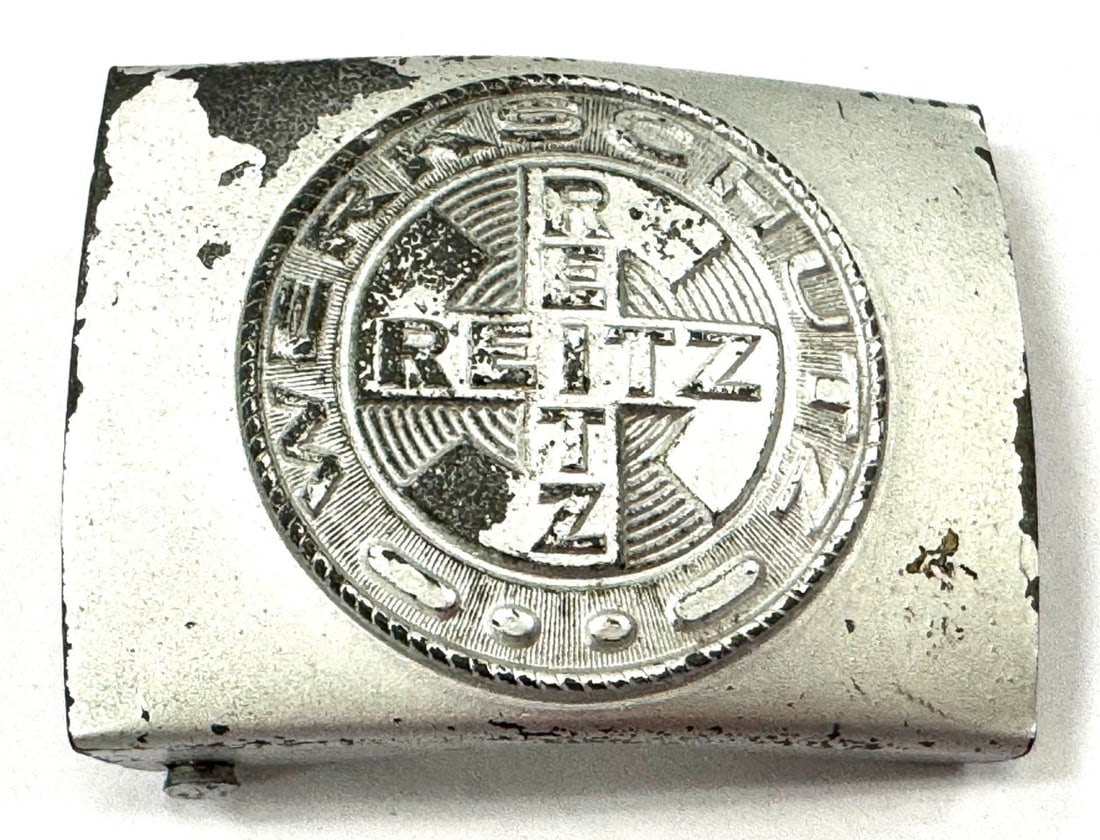 German WW2 Factory Protection Belt Buckle: German WW2 Factory Protection Belt Buckle. Belt Buckle has some wear from age and use and paint chipping. Belt Buckle measures 2 3/4" x 2"