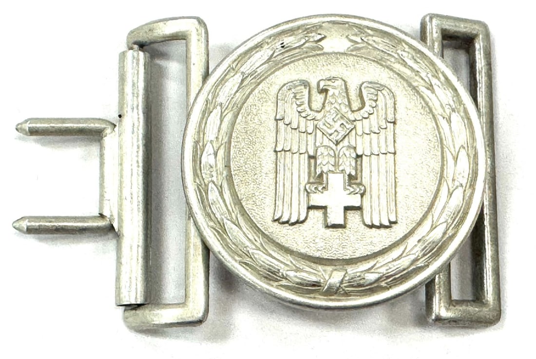 WW2 German Red Cross DRK Officer's Belt Buckle: WW2 German Red Cross DRK Officer's Belt Buckle. Belt Buckle is made out of Aluminum and Stamped Ges. Gesch. Belt Buckle is in overall good condition and measures 2 3/4" x 2"