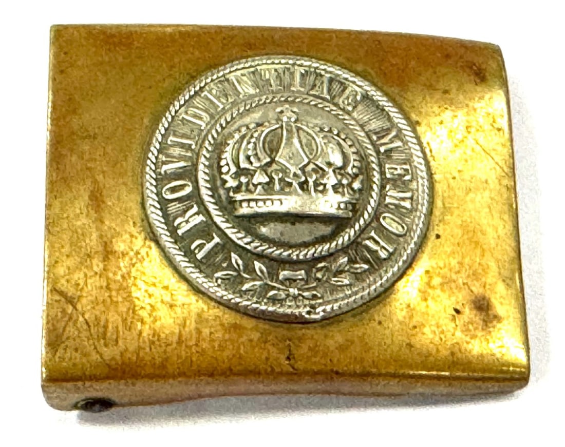Imperial German Saxony Belt Buckle: Imperial German Saxony Belt Buckle. Belt Buckle is inscribed on front with "Providentiae Memor" and inscribed with C.H.Osano. Belt Buckle is missing metal piece on back and has some discoloration and