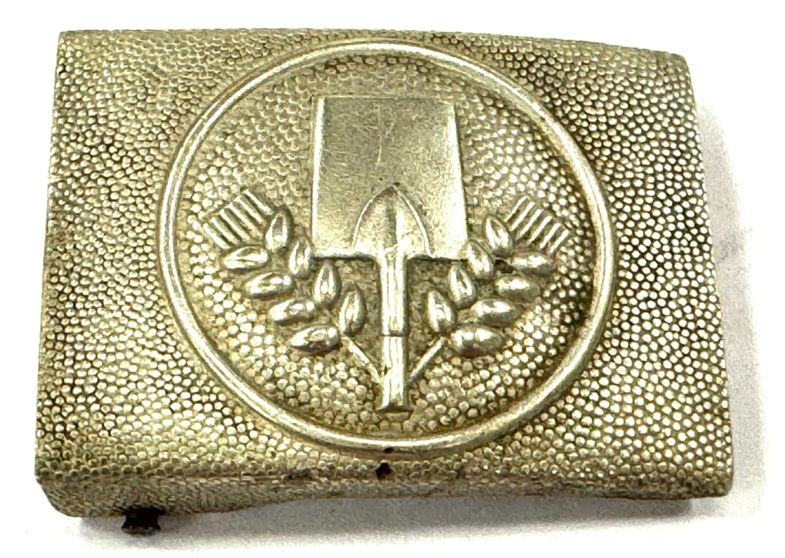 German FAD Voluntary Labor Belt Buckle: German FAD Voluntary Labor Belt Buckle. Belt Buckle has brass catch and is in overall good condition with some finish loss from age and wear. Measures 2 1/2" x 1 3/4"