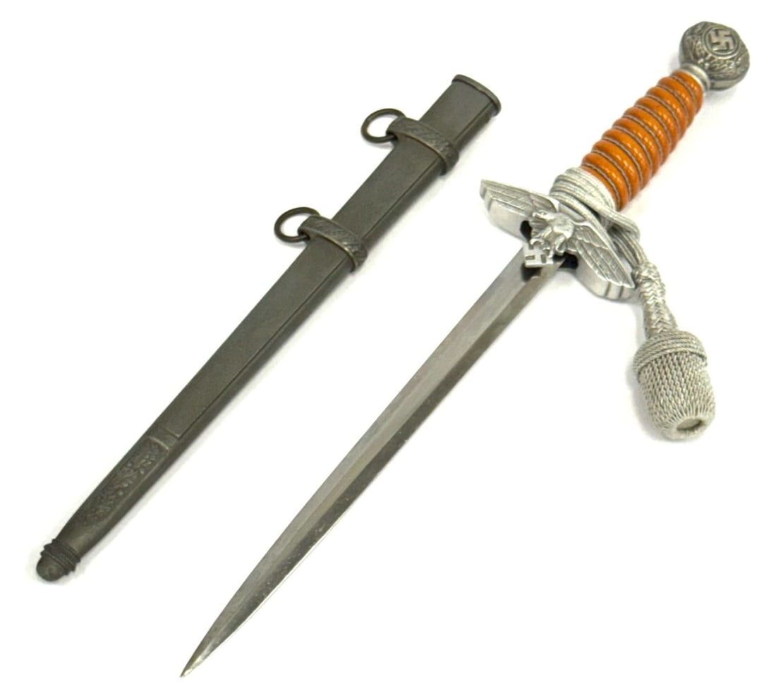 German WW II Puma Luftwaffe Dagger Type 2: German WW II Puma Luftwaffe Dagger Type 2 with Portepee.? This Dagger Appears to Have Had the Crossguard Replaced at Some Time. Blade Measures Approx 10 1/2 ". Overall Length with Scabbard is 16 3/4"