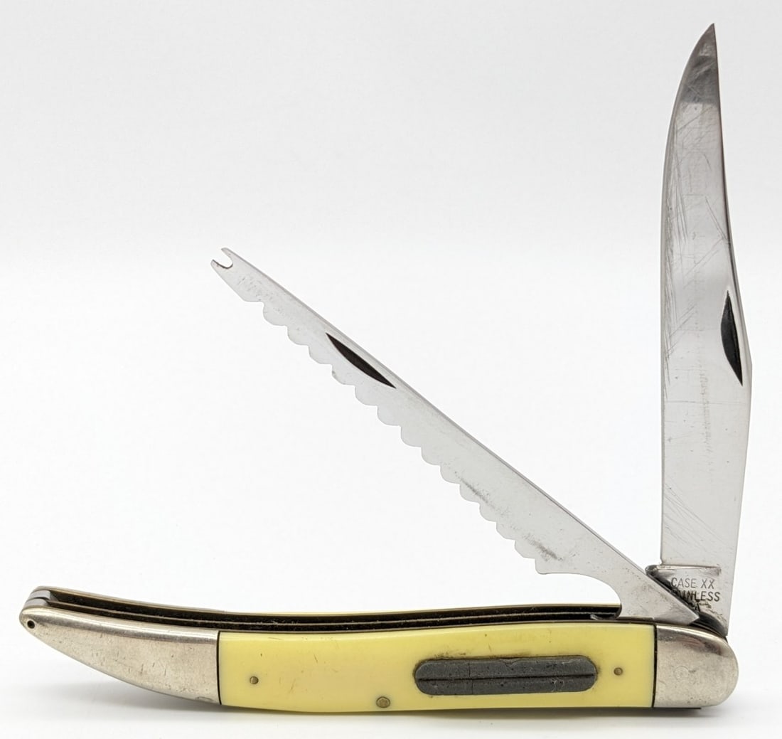 1965-69 Case XX Synthetic Yellow Fishing Knife w/ Sharpening Stone 32095: Knife is in good condition with some scratches on the polished blade, tarnishing and dings on the bolsters, and general scratches and wear on the handle scales from handling and age. Overall measures 