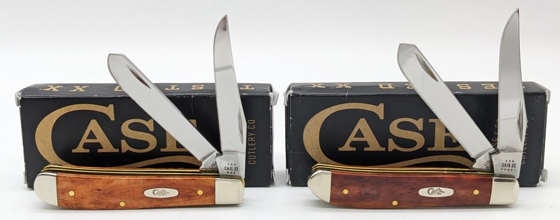 (2) 2024 Case XX Smooth Chestnut Bone Mini Trappers w/ Boxes 6207: Knives are in very nice condition with minimal wear from handling. Overall measures 3-1/2in when closed.