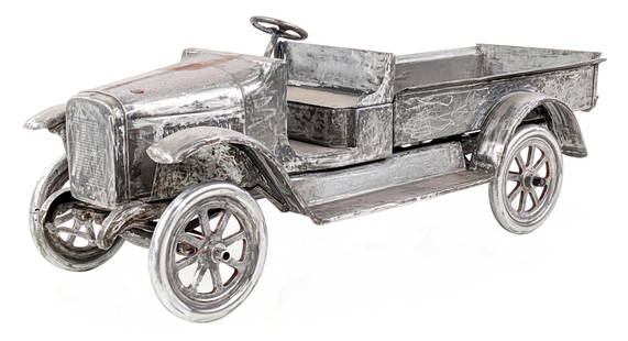 Buddy L Express Truck: Buddy L Express truck. The truck was blasted and is unpainted bare metal. A great candidate for an easy restoration or displays well as it sits. Measures approximately 24" long.