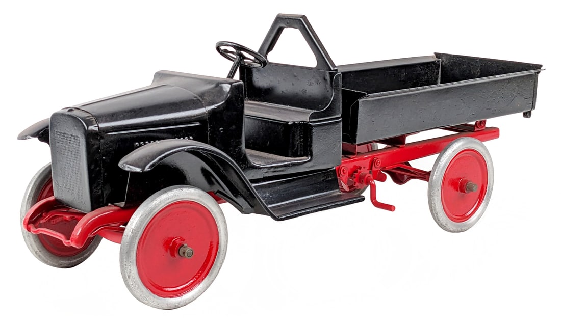 Buddy L "A" Frame Dump Truck: Repainted Buddy L "A" frame dump truck. The truck has an older restoration. The truck shows pitting and wear from age. It is missing the chain for the dump bed mechanism. Measures approximately 25" lo