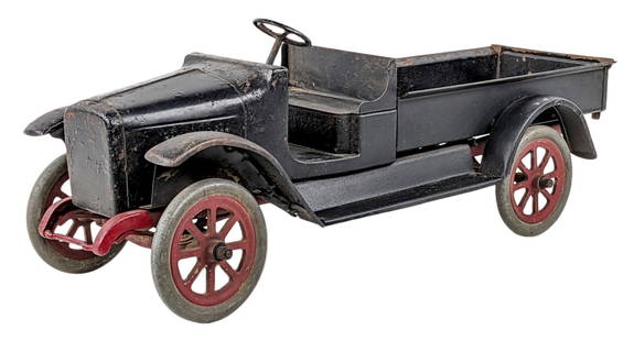 Buddy L Express Truck: Buddy L Express truck. The truck has an older repaint, but the wheels appear to be original. The driver side front fender was repaired, but isn't noticeable unless flipped over. A good, straight resto