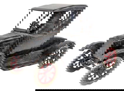 Buddy L Flivver Roadster: Buddy L Flivver roadster. The roof has been repainted and the rest of the car appears to be original. It has paint loss and wear from play / age. Measures approximately 11" long.