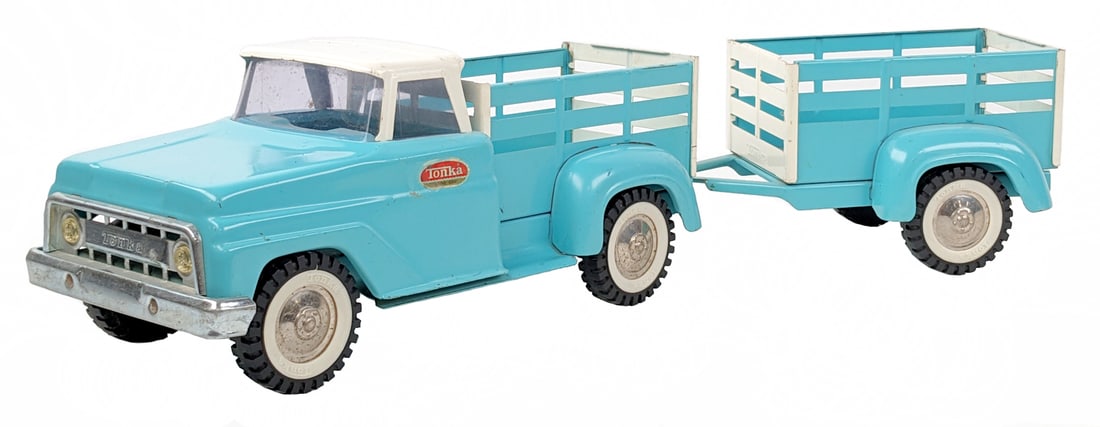 Tonka Stake Pickup Truck w/ Trailer: Tonka stake pickup truck with trailer. The truck and trailer have original paint, but the Tonka door decals appear to have been replaced. A very nice desirable truck done in the Robin Egg Blue / White