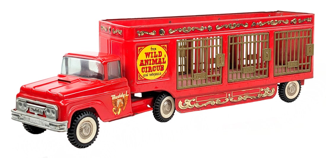 Original Buddy L Wild Animal Circus Truck: Original Buddy L The Wild Animal Circus on Wheels truck. The truck is a fairly nice original with some paint loss and expected age wear. Leo's gate on the passenger side has some damage by the locking