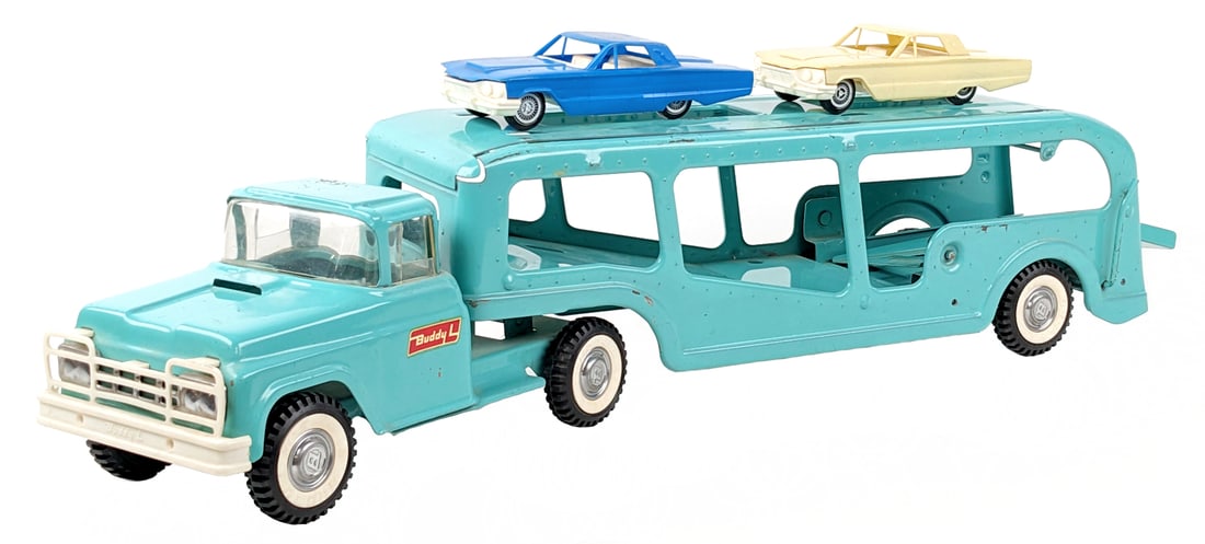Original Buddy L Car Carrier Truck - Turquoise: Original Turquoise Buddy L car carrier truck. The cars on the truck are Structo and wouldn't have originally came on it. The truck has some paint loss and light play wear. Displays well overall in Tur