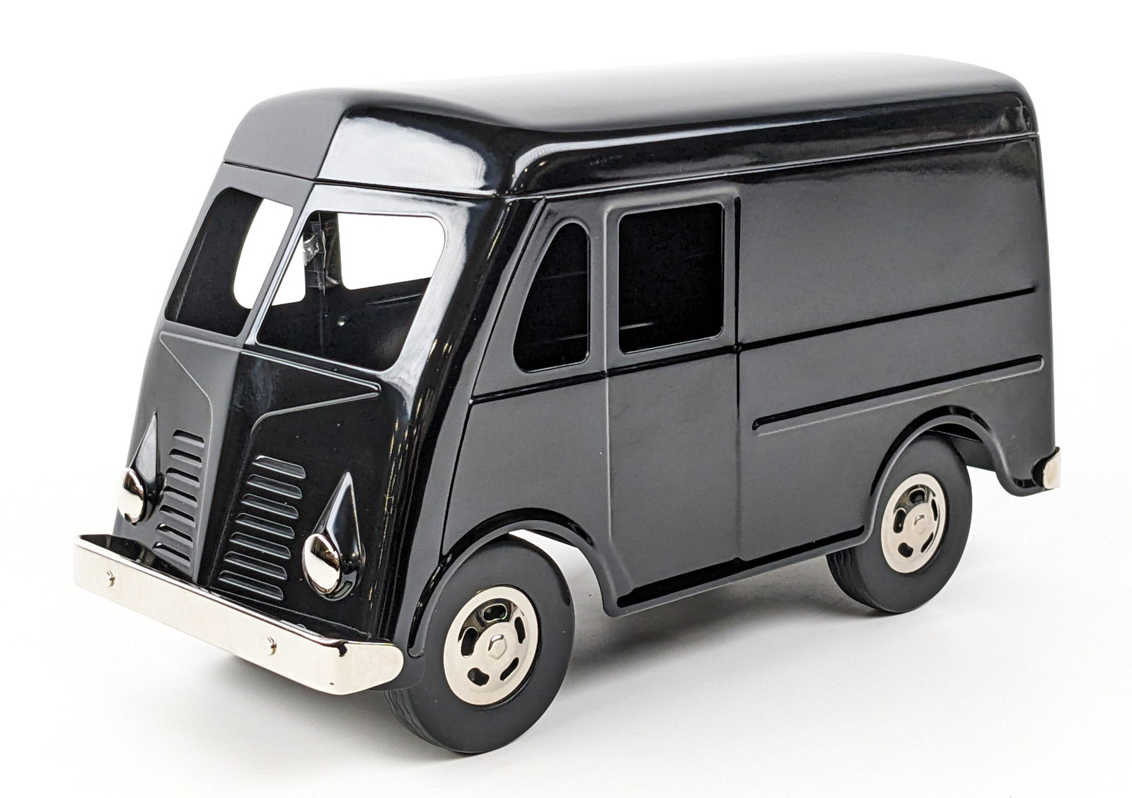 KJ Classics Tonka Black Metro Van: KJ Classics Tonka style black metro van. The van is in great condition new in the box. The van would look great with some decals added. Measures approximately 12" long.