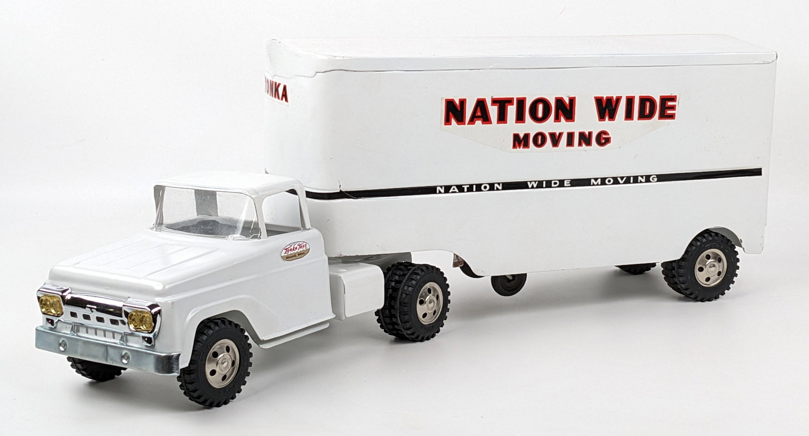 Custom Tonka Nation Wide Moving Truck & Trailer: Custom Tonka Nation Wide Moving Truck and Trailer. An amateur custom job with roughness to the paint and issues with the decals. Measures approximately 24" long.
