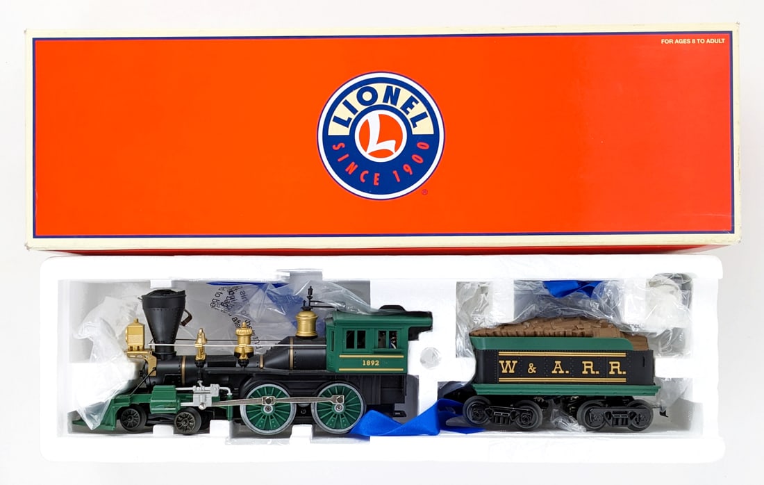 Lionel General 4-4-0 Locomotive w/ Train Sounds Tender: Lionel General 4-4-0 Western & Atlantic Railroad locomotive with train sounds tender. The locomotive and tender are in good condition and appear to be new in the box. The box is in great condition. It