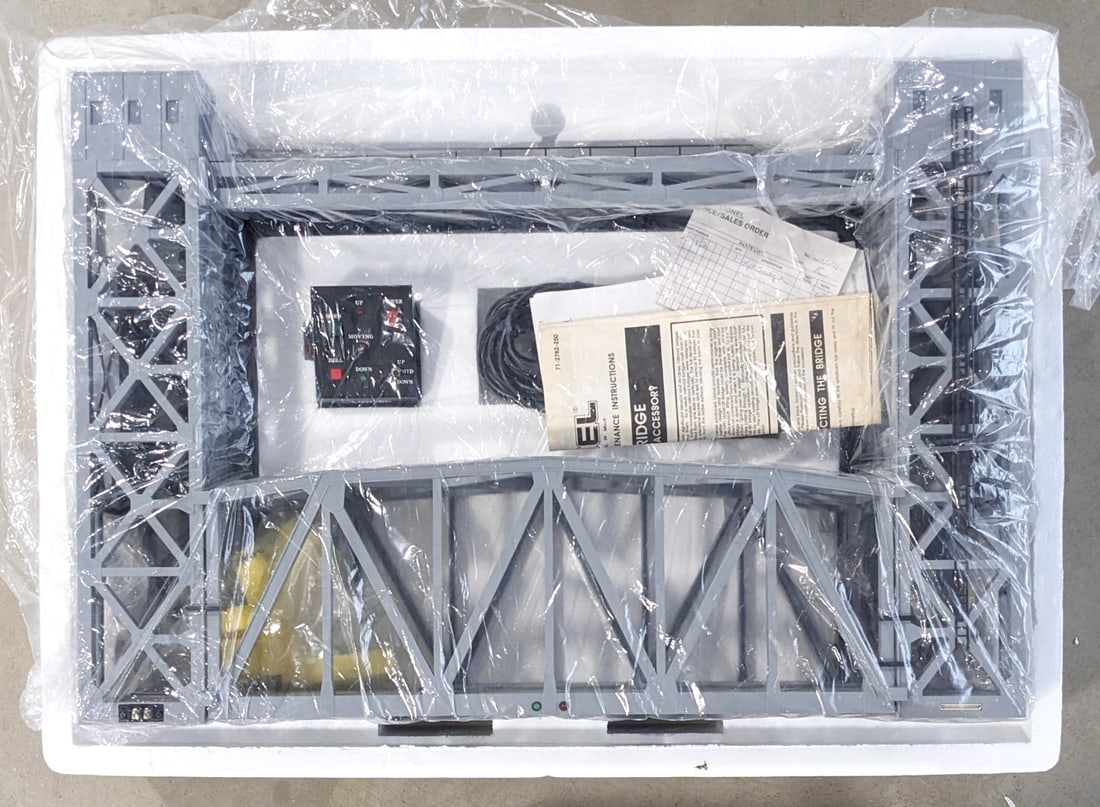 Lionel Lift Bridge 12782: Lionel lift bridge. The bridge is in good condition in the styrofoam, but no box. Appears like new with the plastic and instructions manual. Item No. 6-12782