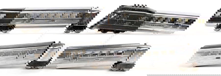 Lionel 616 Flying Yankee Streamliner 4-Piece Set: Lionel Flying Yankee Streamliner 616 / 617 / 617 / 618 set. The set shows some paint loss, rub marks, and excepted wear from running / age.