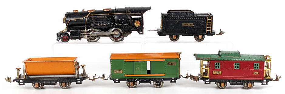 Lionel 635E Locomotive w/ Tender & Cars: Lionel 635E locomotive with tender, No. 805 boxcar, No. 809 side dump car, and No. 807 caboose. The engine is missing the rear wheel set. All showing paint loss and age wear.
