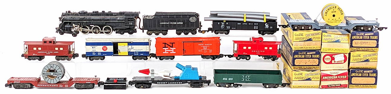 American Flyer 322 Engine w/ Tender & Cars: American Flyer 4-6-4 #322 engine with tender and train cars. Cars include 983 M.P. box car, 930 caboose, 631 gondola car, 984 NH box car, 630 caboose, 911 pipe car, 936 depressed center car, 25059 roc