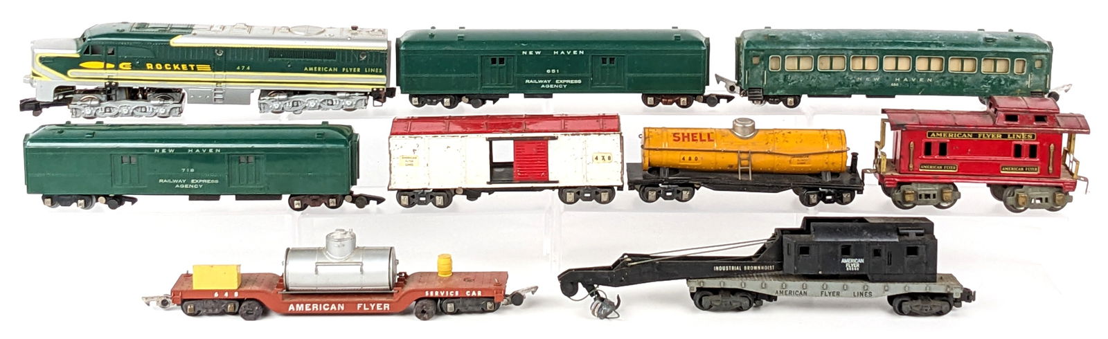 American Flyer 474 478 480 718 648 650 651 24543: American Flyer 474 Rocket Alco diesel engine, 478 boxcar, 480 Shell tanker, 718 NH mail pickup car, 648 track cleaner, 650 NH passenger, 651 NH REA baggage car, and 24543 Industrial Brownhoist crane c