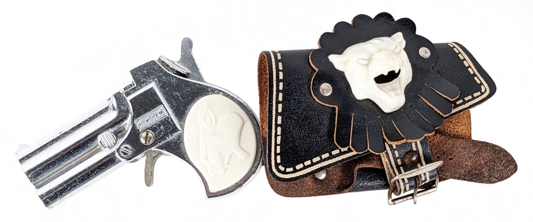 Hubley Panther Pistol 50-Shot Cap Repeater: Hubley Panther pistol 50-shot cap repeater. The gun is in excellent condition and appears to function as it should. The buckle has some minor surface rust. A nice harder to find cap gun.