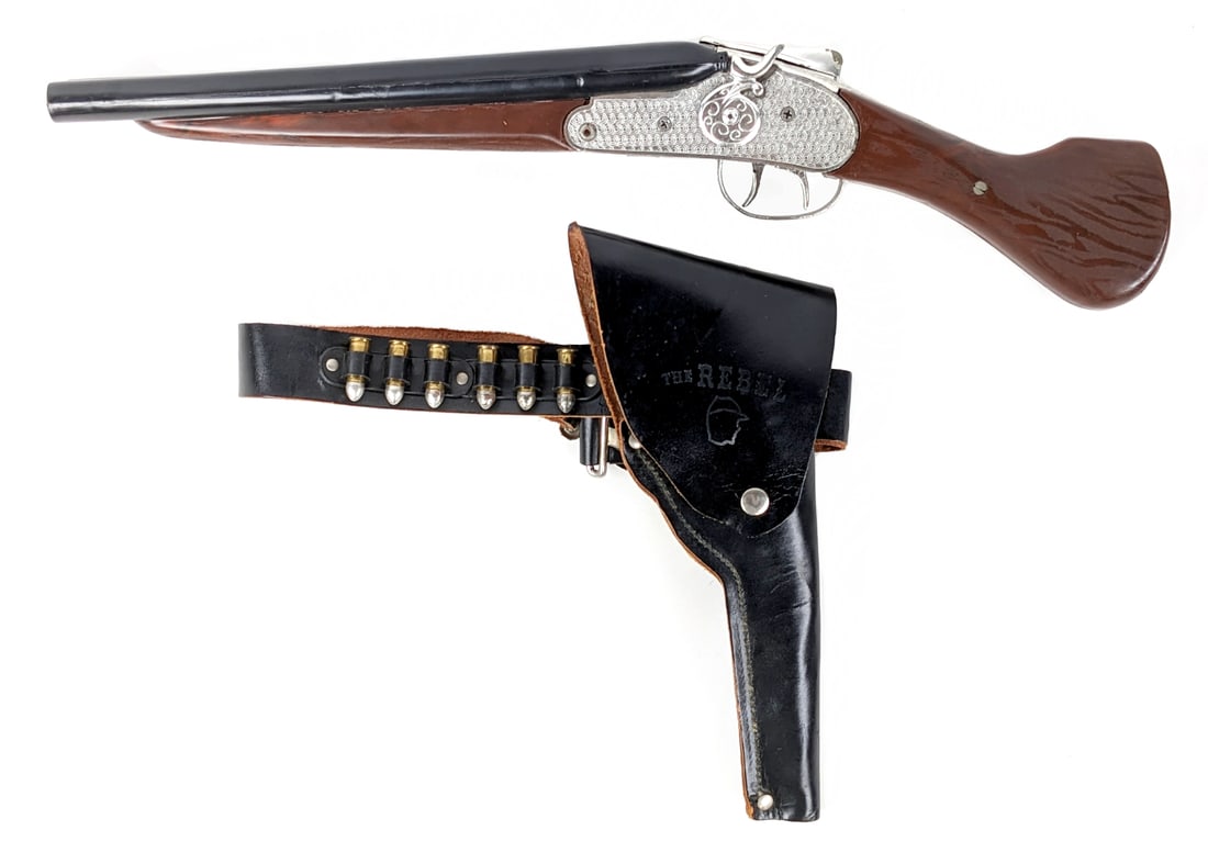 RARE Classy Products Johnny Yuma The Rebel Scattergun Cap Gun: Very rare Classy Products Johnny Yuma The Rebel Scattergun cap gun with The Rebel holster. The holster didn't originally come with the gun. The gun is in overall very good condition. The gun has a bre