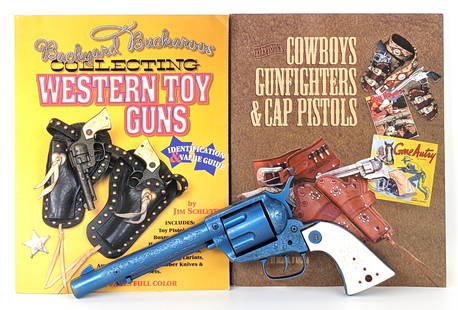 Lone Star Range Rider MKII Cap Gun & (2) Cap Gun Books: Includes Lone Star Ranger Rider MKII cap gun revolver and two cap gun books. The one grip on the gun is damaged. The gun has some color loss and age / use wear. The books are in good condition. The gu