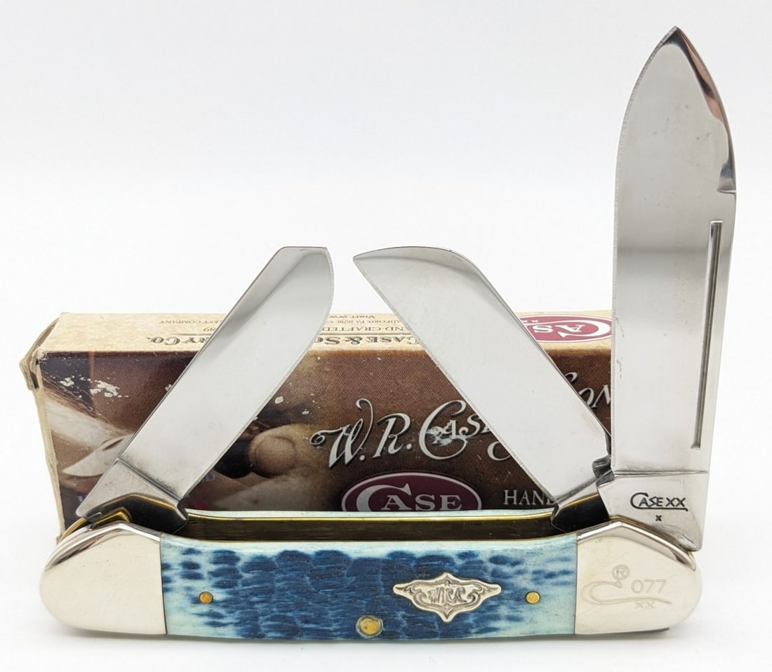 Ltd 2009 Case XX Sky Blue Bone 1 of 100 Gunboat Canoe Knife 6394 w/ Box: Knife is numbered 077, and is in like new condition. Overall measures 4-1/4in when closed.