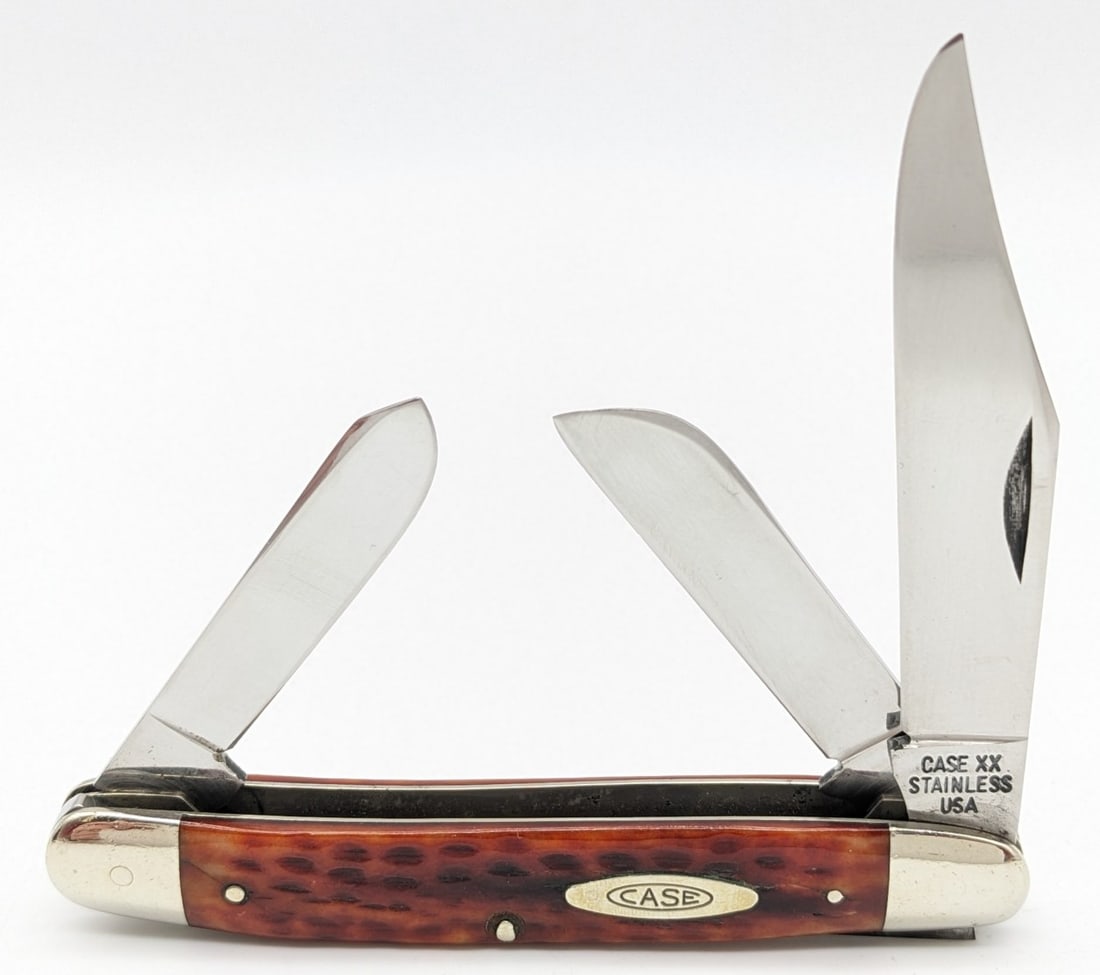 1965-69 Case XX USA Red Bone Stainless Medium Stockman 6347: Knife is in nice condition with light scratches on the polished blades, scuffs and dings on the polished bolsters, and pin cracks on the upper and lower front handle scale pins. Overall measures 3-7/8