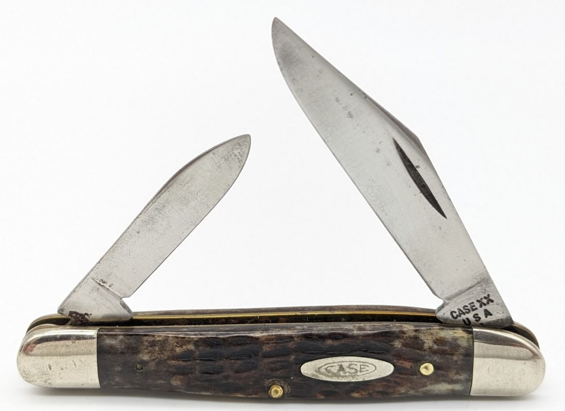 1979 Case XX Jigged Bone Half Whittler 6208: Knife is in fair condition with some light pitting and carbon spots on the blades, scuffs and dings on the bolsters, and nice handle scales. Overall measures 3-1/4in when closed.
