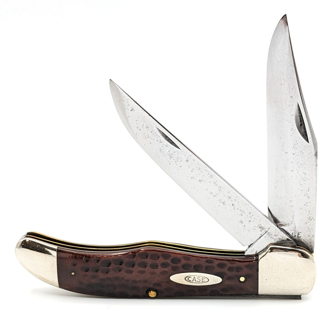 1940-64 Case XX Jigged Bone Folding Hunter 6265: Knife is in good cleaned condition with material loss and some pitting on the polished blades, scratches and dings on the polished bolsters, and nice pocket worn handle scales. Overall measures 5-1/4i