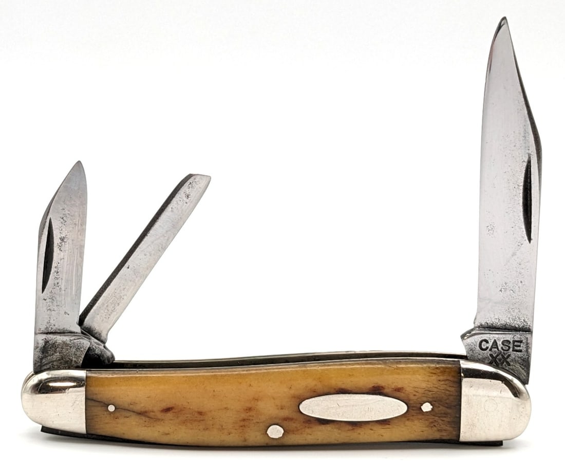1940-64 Case XX Rogers Bone Whittler 6380: Knife is in aged cleaned condition with material loss and pitting on the polished blades, scuffs and dings on the polished bolsters, and well pocket worn handle scales with a pin crack on the front, a