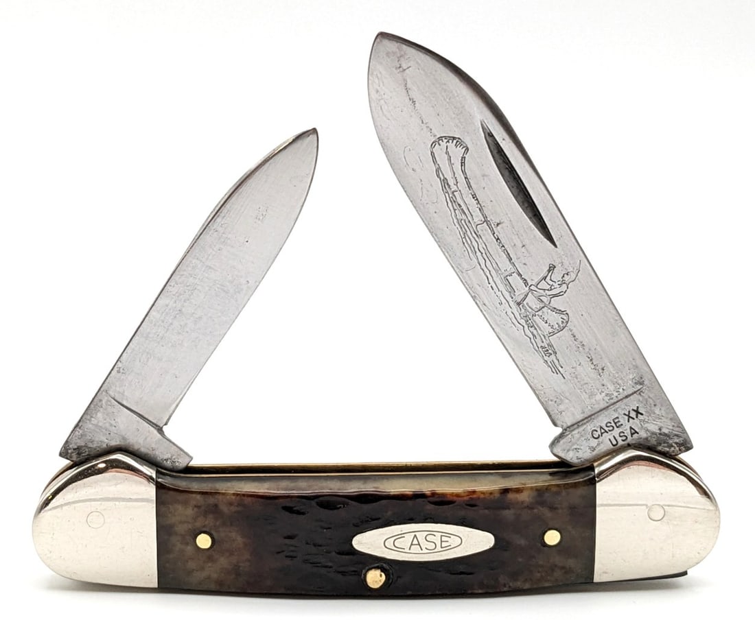 1979 Case XX Jigged Bone Canoe Knife 62131: Knife is in fair condition with scratches and some pitting on the blades, scuffs and dings on the polished bolsters, and nice handle scales. Overall measures 3-5/8in when closed.