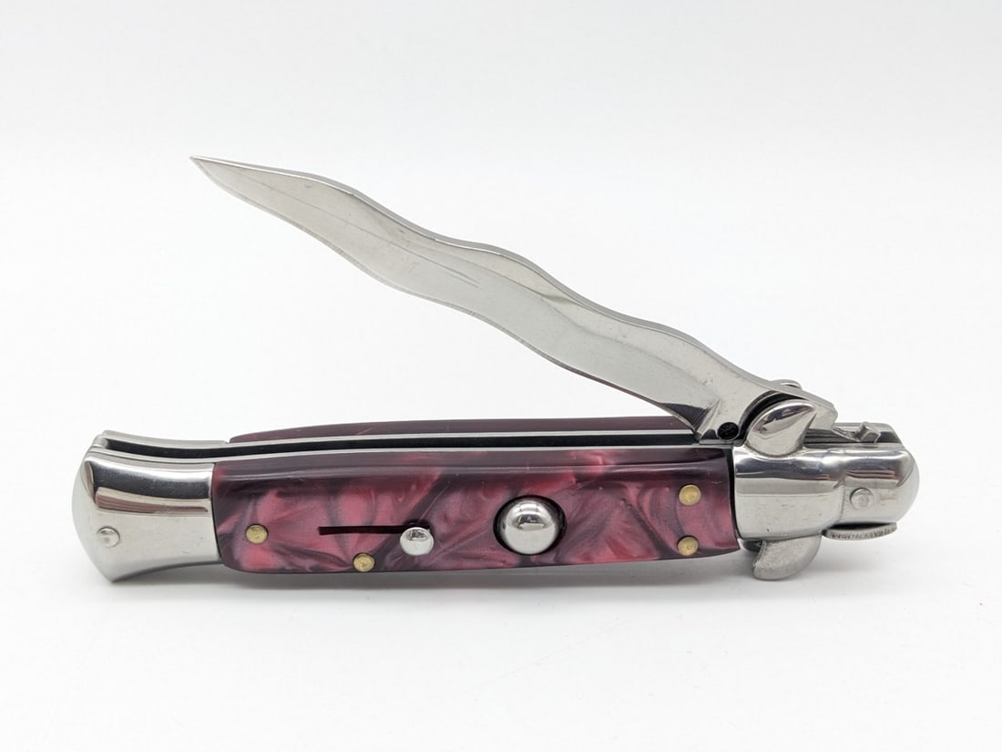 AKC Marbled Red Synthetic Kriss Switchblade Knife (1 of 4)