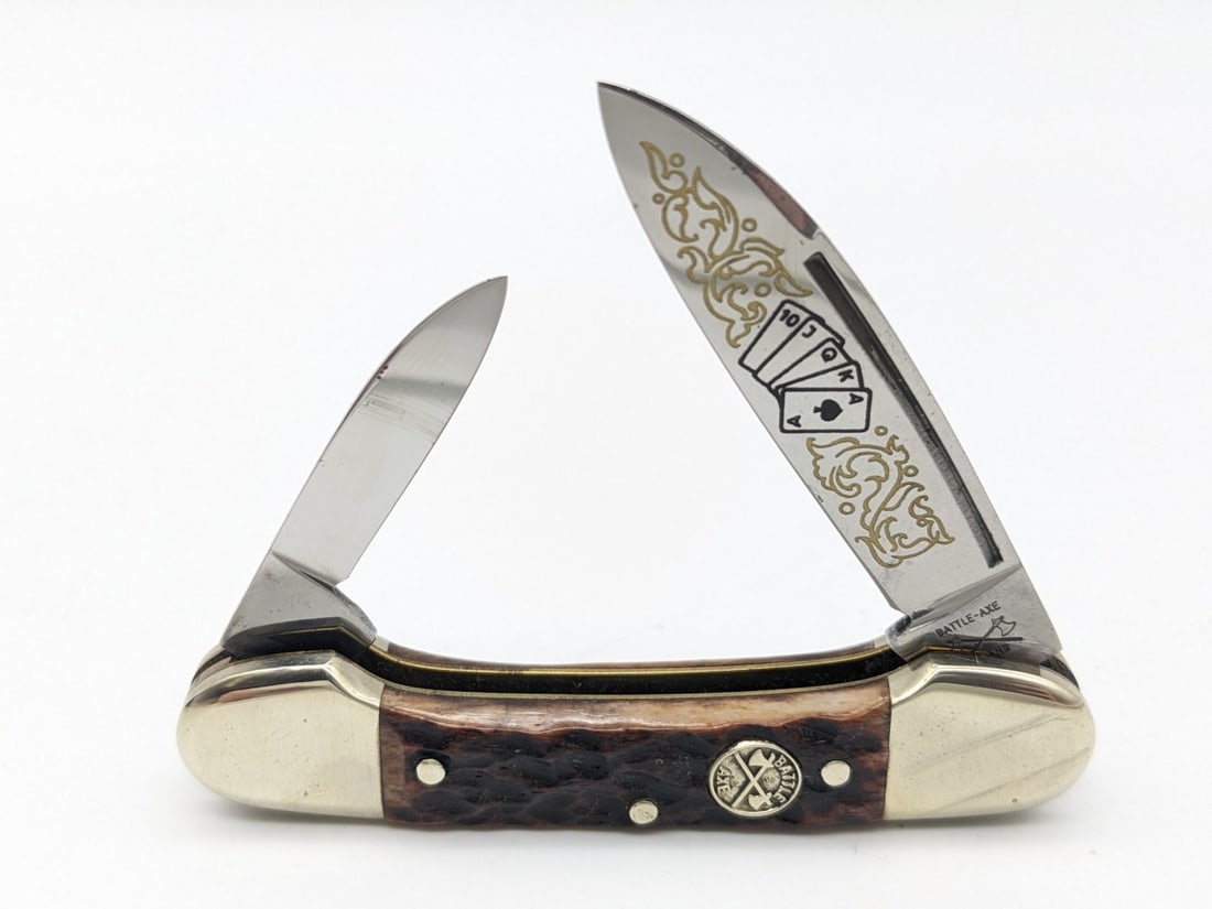 Ltd Battle Axe Brand The Gambler Jig Bone Canoe Knife: Knife is numbered 351 in very nice condition with some tarnish on the bolsters from handling. Overall measures 3-1/8in when closed.