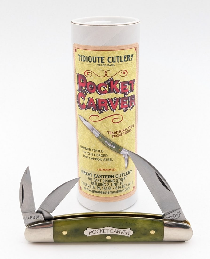 Great Eastern Cutlery Smooth Green Banana Bone Pocket Carver Knife 620324 w/ Tube: Knife is adorned with a pocket carver shield and includes a pocket carver promotional button. Knife is in very nice condition with light wear from handling. Overall measures 3-7/8in when closed.