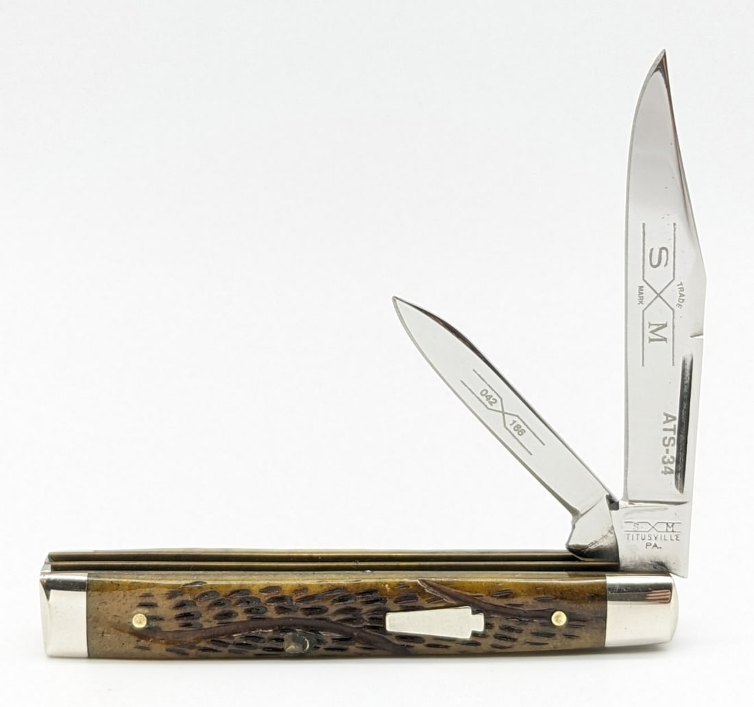 Schatt & Morgan Queen Cutlery Jigged Bone Small Physician's Knife ATS-34 042 166: Knife is in nice condition with light scuffs and tarnishing from handling. Overall measures 3-1/4in when closed.