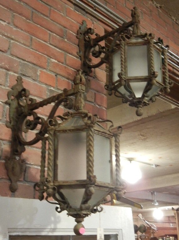 Pair of Argentinean Wrought Iron Outdoor Sconce Lights,: Pair of Argentinean Wrought Iron Outdoor Sconce Lights, 6 Sided w/ Glass Panels, from Estate of Jose Thenee